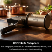 HONE rolling sharpener beside a knife resting against the black knife holder on a kitchen worktop