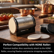 HONE Knife Sharpener roller in the Vertical Strop stand with discs attached at both ends and two loose discs beside it