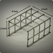 Small rectangular metal rack labelled 4 by 3 by 2 inches