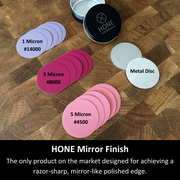 Colour-coded HONE Mirror Finish films labelled 1, 3 and 5 micron beside two silver discs and a black case